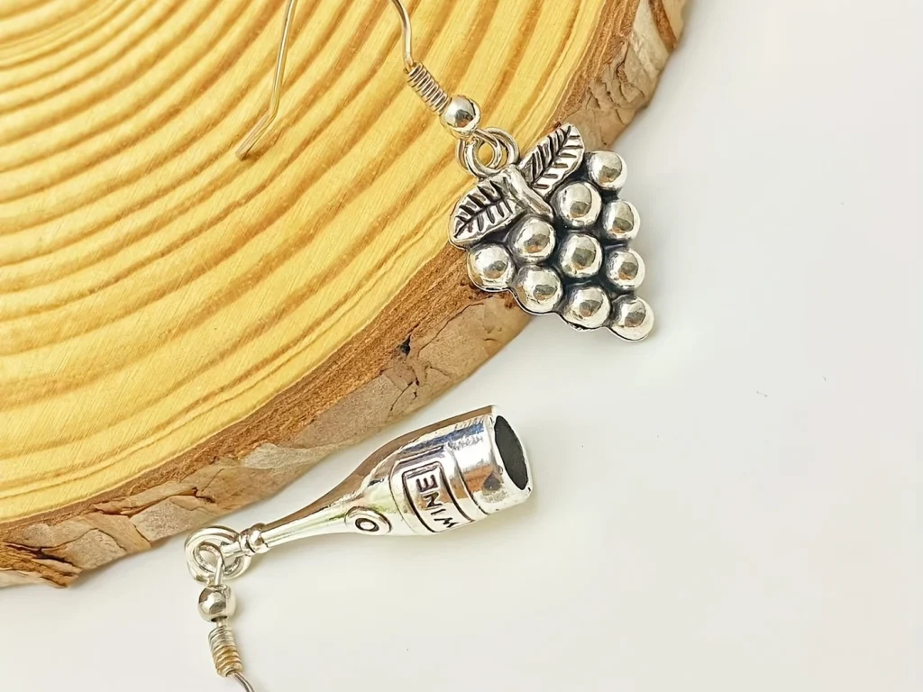Grape and Wine Bottle Mismatched Drop Earrings showing styling or color variation