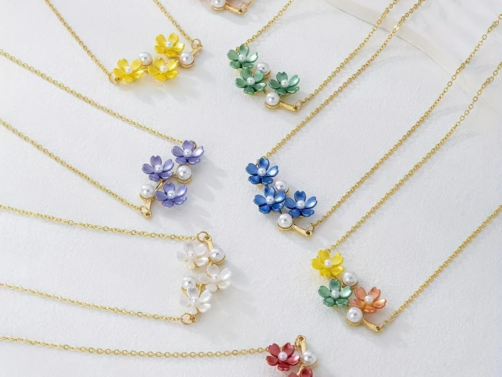 Group image of multiple floral pendant necklace colorways