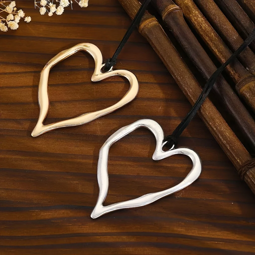Gold-tone and silver-tone heart pendants arranged together