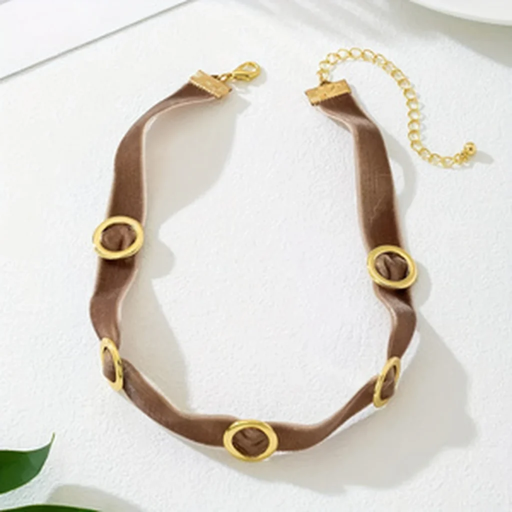 Brown velvet choker laid flat showing full front view