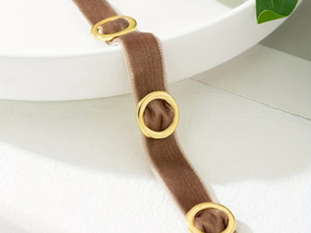 Brown velvet choker structural detail