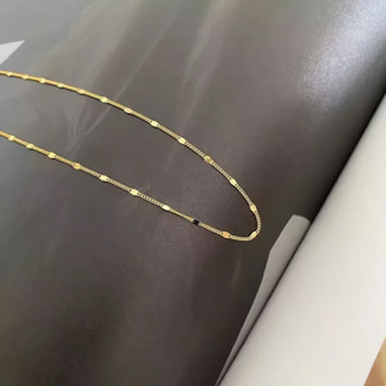 Gold-tone station chain necklace front product view