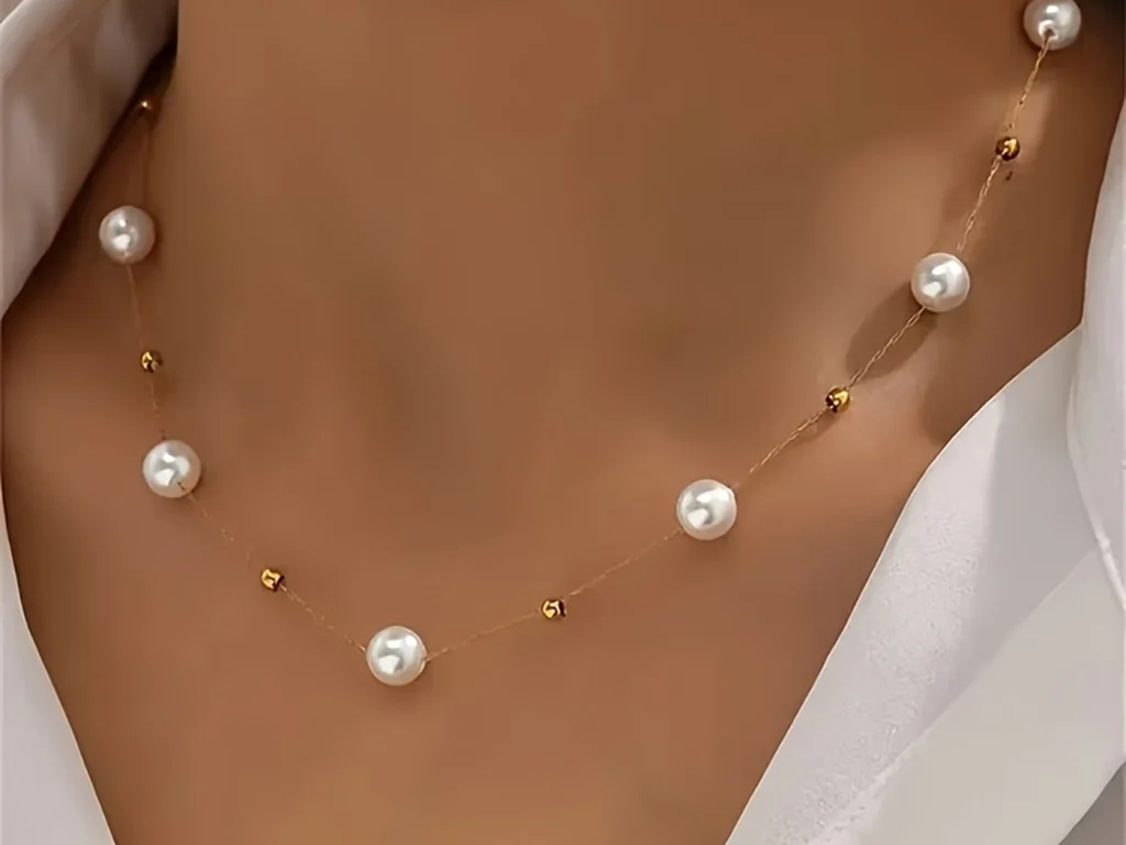 Pearl station necklace worn styling reference