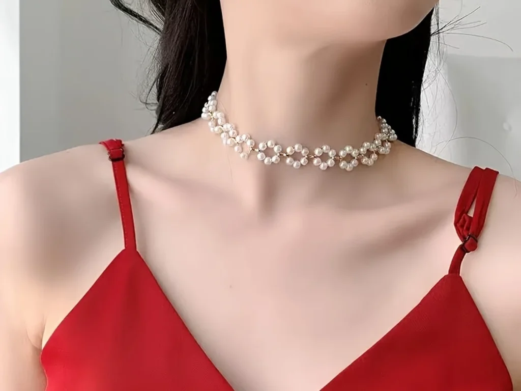 Pearl floral choker necklace styled with red outfit