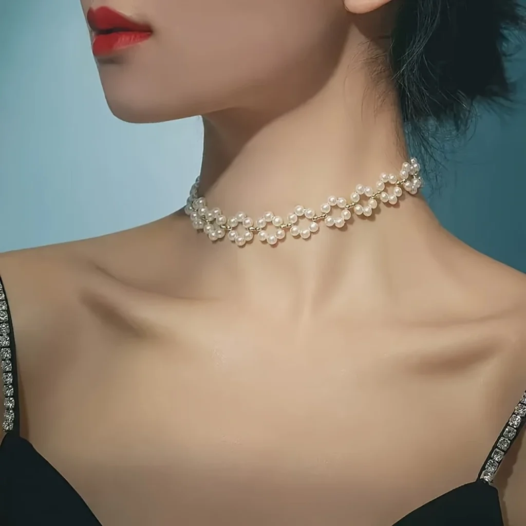 Pearl daisy choker necklace worn on a model profile