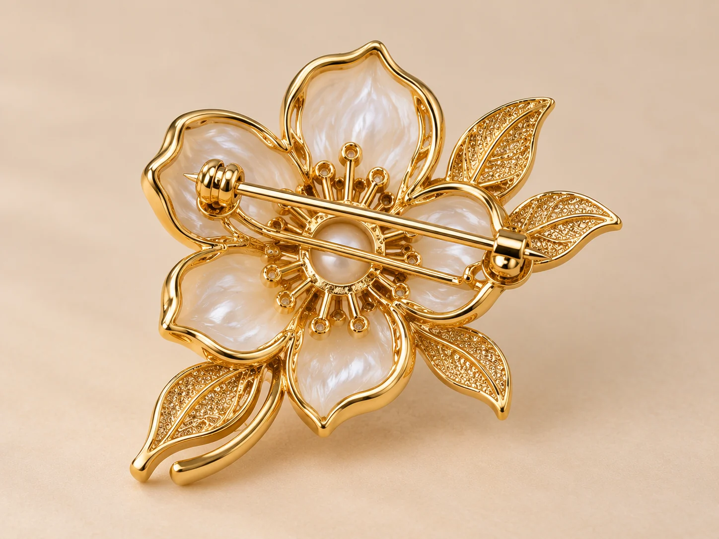 Back view of a custom floral brooch showing the pin fastening structure