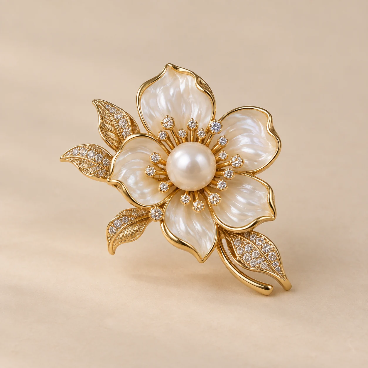 Custom brooch with pearl and floral details on a warm neutral background