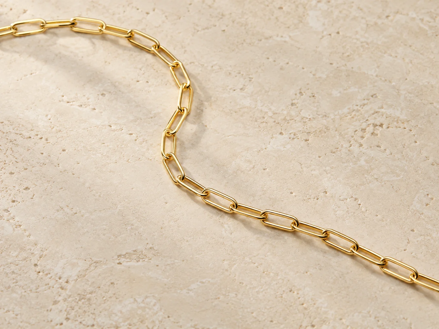 Gold-tone paperclip chain with elongated rectangular links